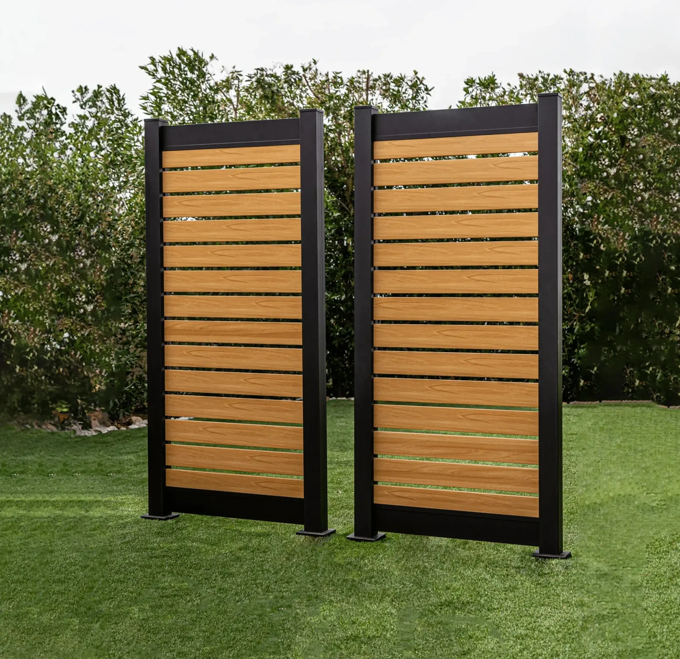 Wood-grain aluminum fence panels keeping a clean finish in a Canadian yard